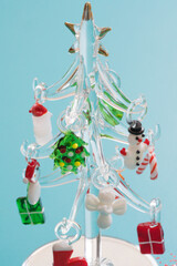 Fototapeta na wymiar Glass Christmas tree with ornaments