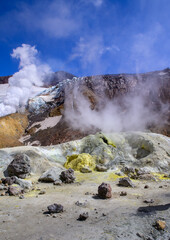 Landscape. the fumarole valley of the Mutnovsky volcano, in which you can see columns of steam of boiling water and sulfur. then the ascent takes place on the glacier . Kamchatka Peninsula