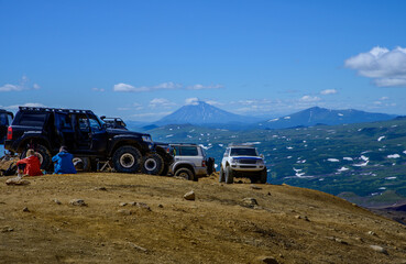 Parking the car at the beginning of the trail for climbing the Mutnovsky volcano. Kamchatka Peninsula