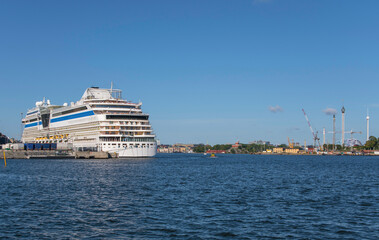Fototapeta na wymiar Skyline view and cruise ship of the Stockholm harbor.