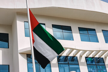 A United Arab Emirates flag flying in the wind