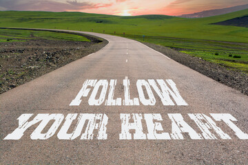 Follow Your Heart written on rural road