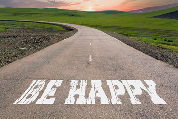 Be Happy written on rural road
