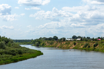 Fototapeta na wymiar View on Winding river in rural area.