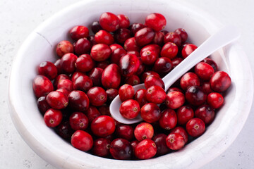 Bakery background with ingredients for cooking Christmas baking. Flour, brown sugar, cranberry and spices top view