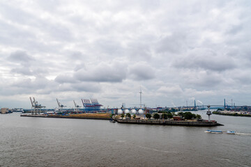 Fototapeta na wymiar Aerial view of the industrial port of Hamburg in Germany. Cloudy day