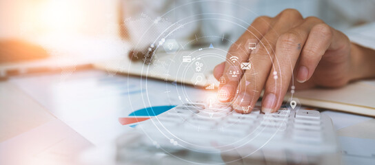 Close up of Business woman using calculator accountant or financial expert coins double exposure...