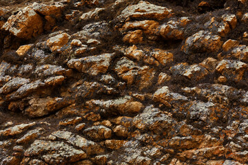Red and gray colored rocks with lichen, wallpaper
