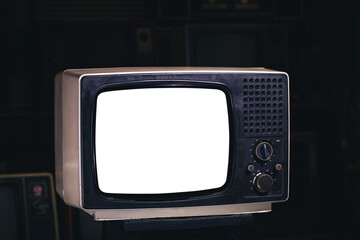 Retro old TV with cut blank screen on dark background.