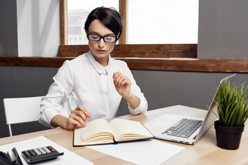 Business woman in front of laptop Professional work technology communication