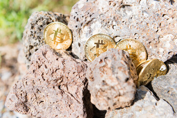 Cryptocurrency concept with bitcoins in bitcoin mine.