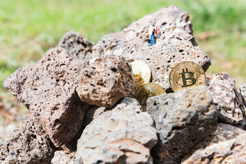 Cryptocurrency concept with bitcoins in bitcoin mine.