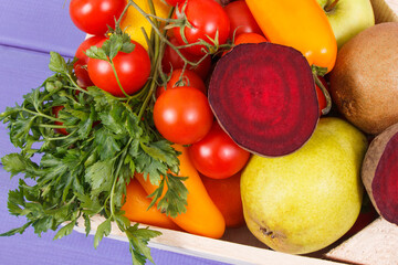 Fresh ripe natural fruits and vegetables in box. Nutritious food containing healthy minerals and vitamins