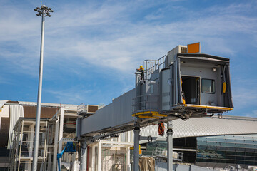 Passengers are connected to planes in the airport