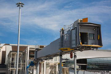 Passengers are connected to planes in the airport