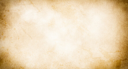 An old stained blank sheet of beige paper with a vignette