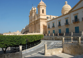 Fototapeta na wymiar Noto is a wonderful baroque city in Sicily. Its central course is a treasure of Baroque architecture. Here the marvelous cathedral with the immense staircase. 