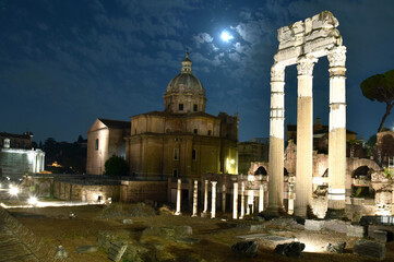 Roman forum and church at night