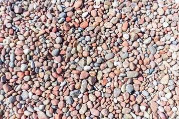 Natural colorful pebble background texture with copy space.Sea stone,Sea stones top view. Copy space.