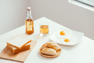 Obraz na płótnie Canvas Breakfast at the table by the window.