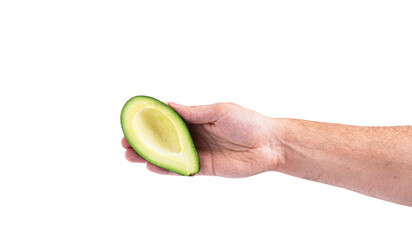 Avocado in hand isolated on a white background.
