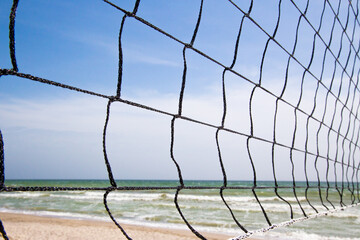 Beach volleyball net close-up, summer vacation, sport concept