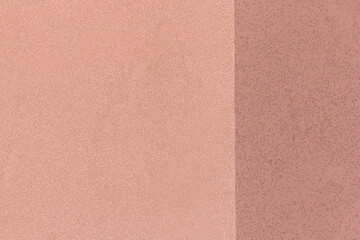 Fototapeta premium Wall of two colors - beige and coffee light, template or surface for text and design, texture and background