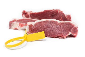Three pieces of calf with a yellow label on a white background