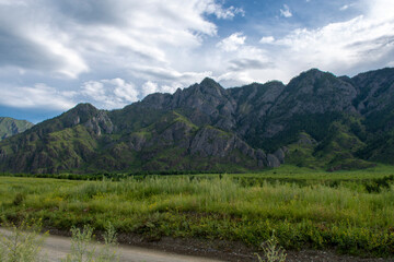Gorny Altai, Russia. High mountains and dirt roads are the harsh beauty of nature.