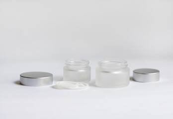 jar of cream on a white background