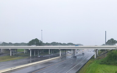 A busy highway in the rain 