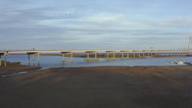Slow rise revealing Arthur Ravenel Jr. Bridge