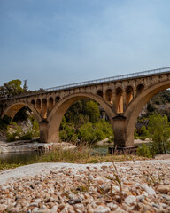 Fototapeta premium Ancient arch bridge in Provence, France