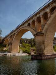 Ancient arch bridge in Provence, France