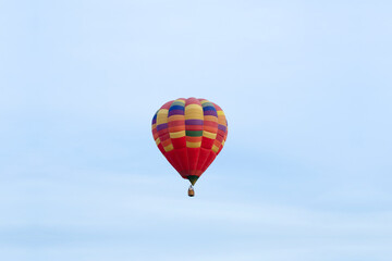 Aerostat. Big balloon. In the blue sky. Red.