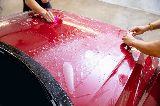 Concept paint protection PPF is polyurethane film installation on hood modern luxury car