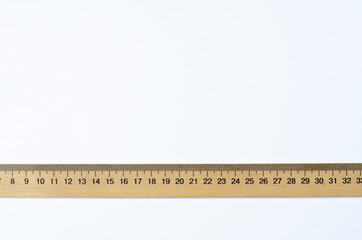 Wooden ruler. Measuring tape. On white background. Measuring tool