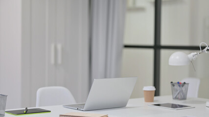 Modern Workstation with Laptop and Tablet 