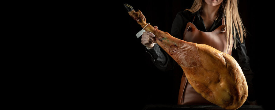 Slicing Spanish jamon iberico. Spanish jamon and traditional food