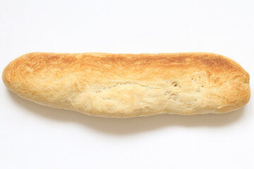 Fresh homemade wheat bread on a light background. 