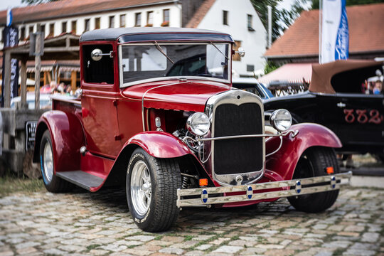 DIEDERSDORF, GERMANY - AUGUST 21, 2021: The pickup truck Chevrolet, 1930. Focus on center. Swirly bokeh. The exhibition of "US Car Classics".