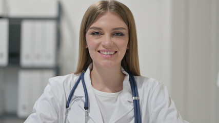 Female Doctor Smiling at Camera 