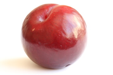 Large plum berry. Plum is a genus of plants in the Pink family. 