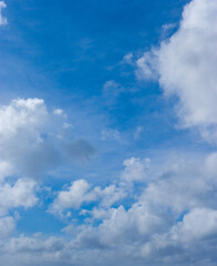 Naklejka na ściany i meble Cloudscape on blue sky