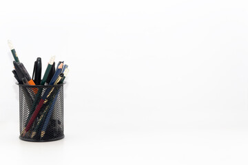 pencil holders on white background
