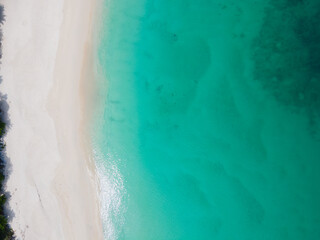 PHUKET,THAILAND. Aerial view beach and sea. White beach beach sand and blue sea water. White yacht on sea.