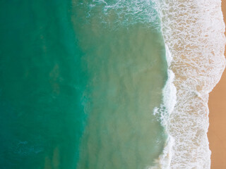 PHUKET,THAILAND. Aerial view beach and sea. White beach beach sand and blue sea water. White yacht on sea.