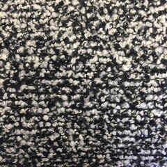 Black and white boucle knitted fluffy fabric texture