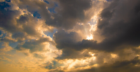 sun rays and clouds