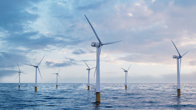 Wind Turbines. Offshore Wind Farm at Dusk. Environmental Power Concept.